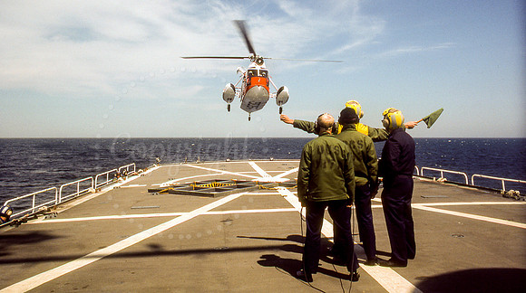 USCG HH-52 helicopter approaching the deck on USCGC Gallatin (WHEC-721)
